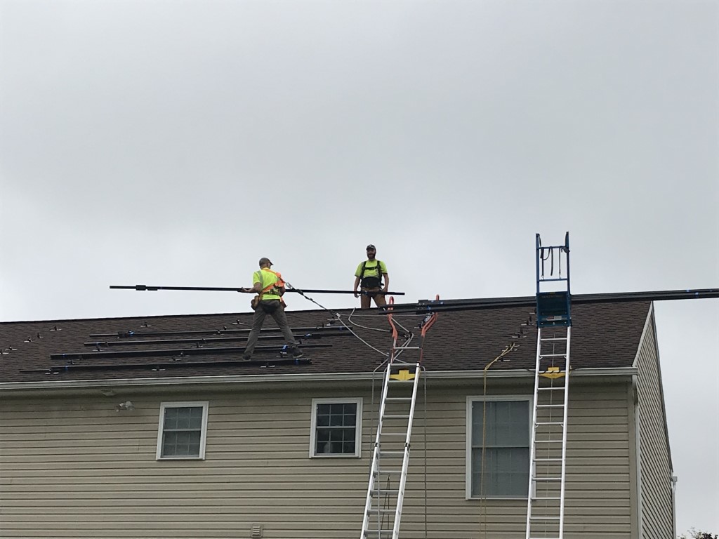 Installers on Roof Racks