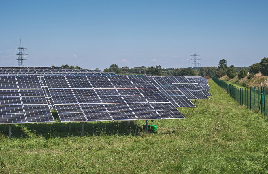 large scale solar panel farm in field